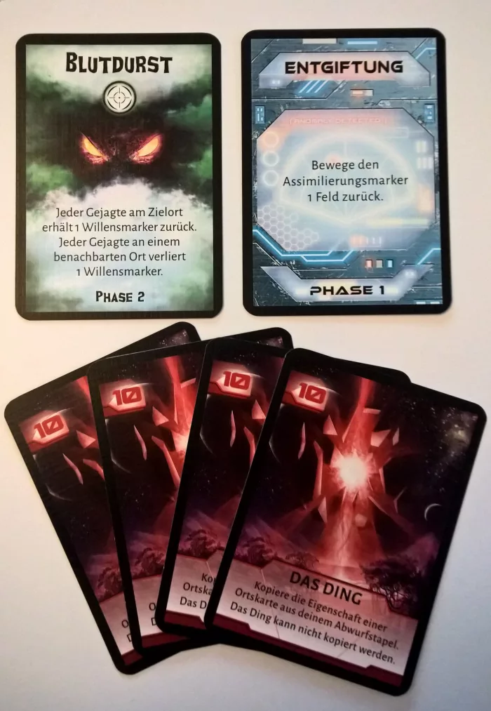 Not Alone: The Red Artefact Promo Cards